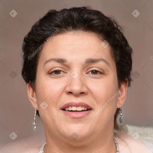 Joyful white adult female with short  brown hair and brown eyes