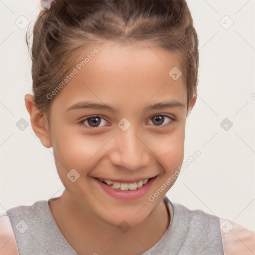 Joyful white child female with short  brown hair and brown eyes