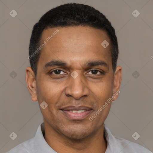 Joyful latino adult male with short  black hair and brown eyes
