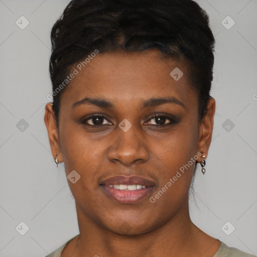Joyful black young-adult female with short  brown hair and brown eyes