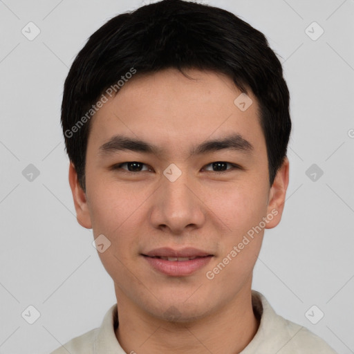 Joyful asian young-adult male with short  black hair and brown eyes