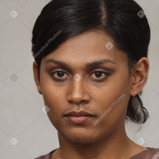 Neutral black young-adult female with short  brown hair and brown eyes