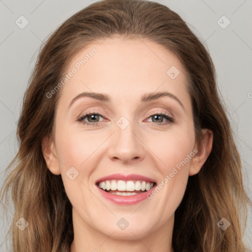 Joyful white young-adult female with long  brown hair and grey eyes