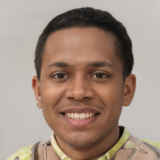 Joyful latino young-adult male with short  black hair and brown eyes