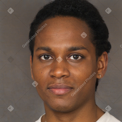 Joyful black young-adult male with short  black hair and brown eyes