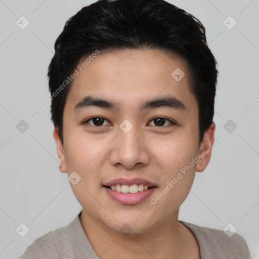 Joyful asian young-adult male with short  brown hair and brown eyes