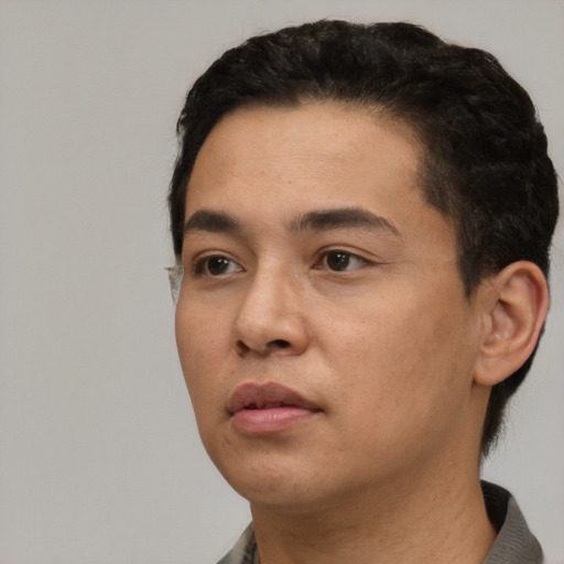 Neutral white young-adult male with short  black hair and brown eyes