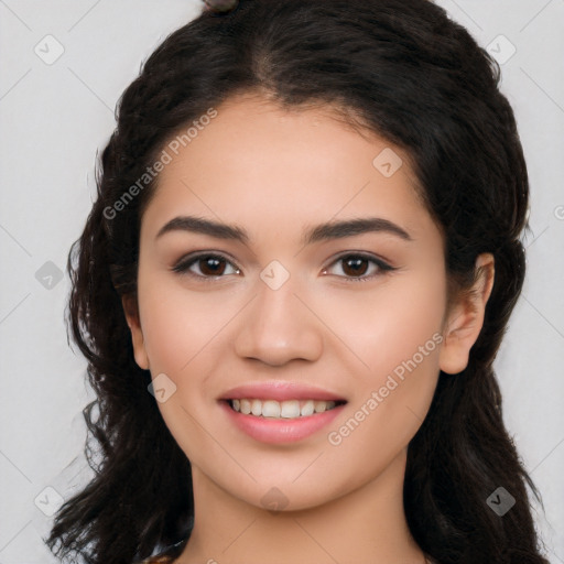 Joyful white young-adult female with long  black hair and brown eyes