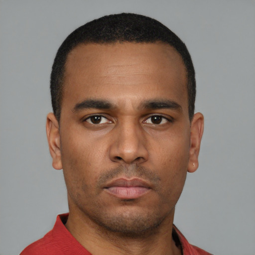 Neutral latino young-adult male with short  brown hair and brown eyes