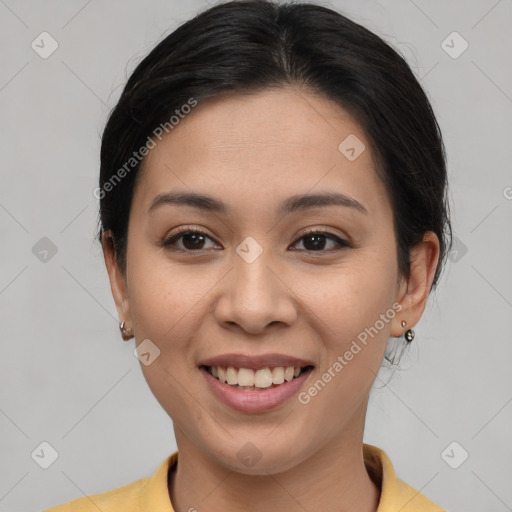 Joyful asian young-adult female with medium  brown hair and brown eyes