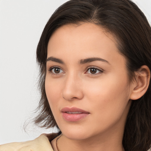 Neutral white young-adult female with medium  brown hair and brown eyes