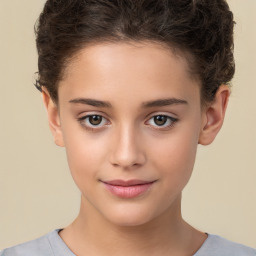 Joyful white child female with short  brown hair and brown eyes