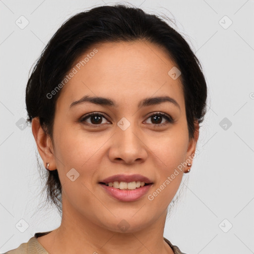 Joyful latino young-adult female with medium  brown hair and brown eyes