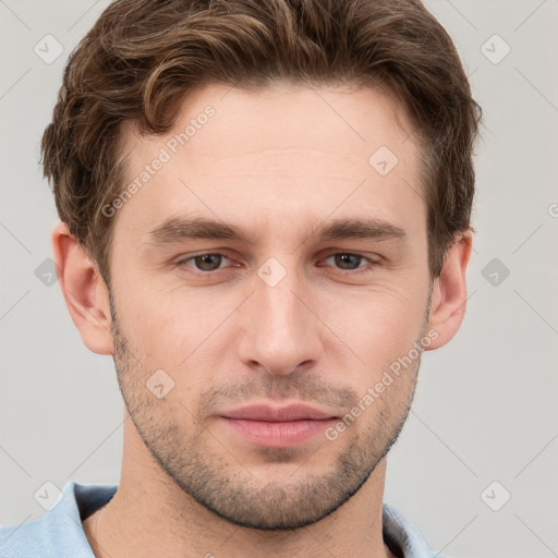 Neutral white young-adult male with short  brown hair and grey eyes