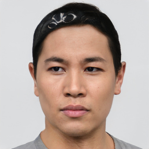 Neutral asian young-adult male with short  black hair and brown eyes