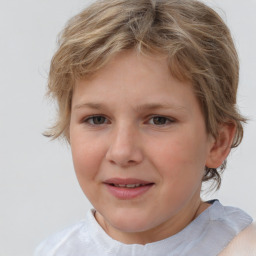 Joyful white child female with medium  brown hair and grey eyes