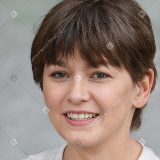 Joyful white adult female with medium  brown hair and brown eyes