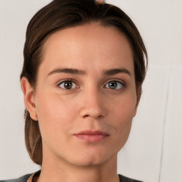 Neutral white young-adult female with short  brown hair and grey eyes