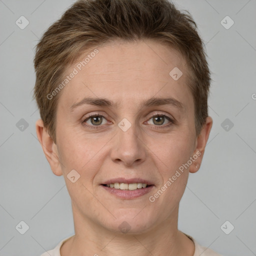 Joyful white adult female with short  brown hair and grey eyes