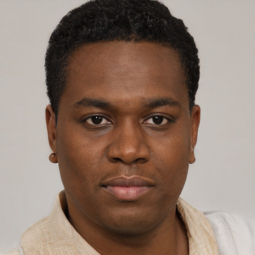 Neutral black young-adult male with short  black hair and brown eyes