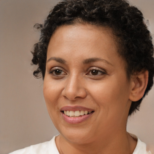 Joyful white adult female with short  brown hair and brown eyes