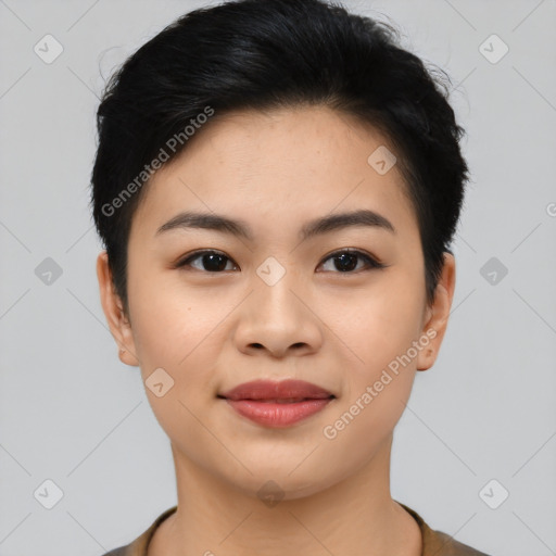 Joyful asian young-adult female with short  black hair and brown eyes