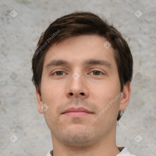 Neutral white young-adult male with short  brown hair and brown eyes