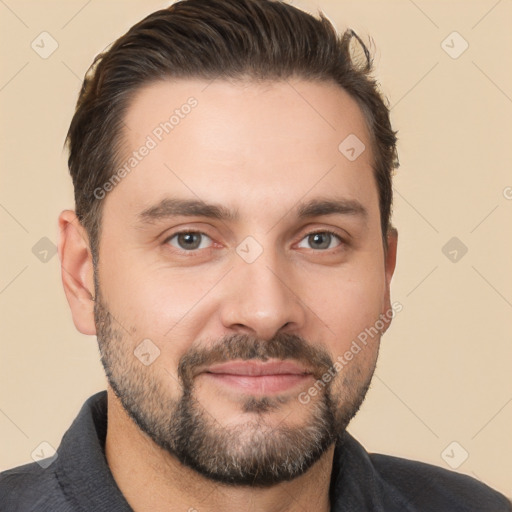 Joyful white young-adult male with short  brown hair and brown eyes