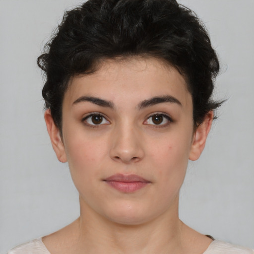 Neutral white young-adult female with short  brown hair and brown eyes