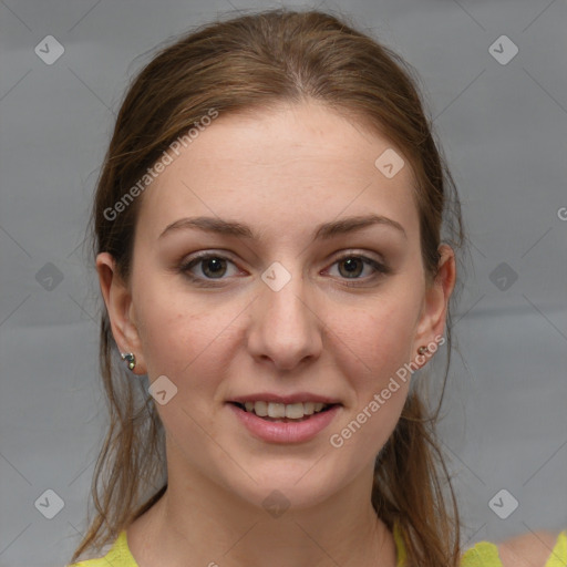 Joyful white young-adult female with medium  brown hair and grey eyes