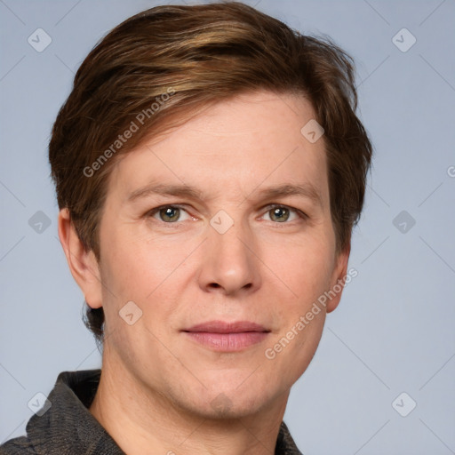 Joyful white adult male with short  brown hair and grey eyes