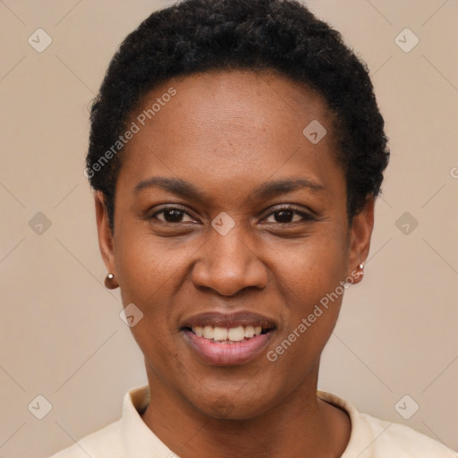 Joyful black young-adult female with short  black hair and brown eyes