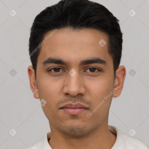 Neutral latino young-adult male with short  black hair and brown eyes