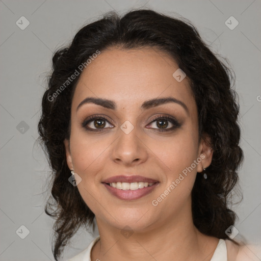 Joyful latino young-adult female with medium  brown hair and brown eyes