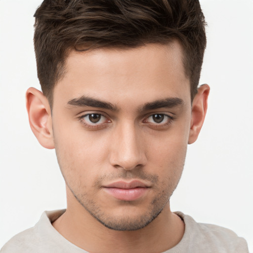 Neutral white young-adult male with short  brown hair and brown eyes