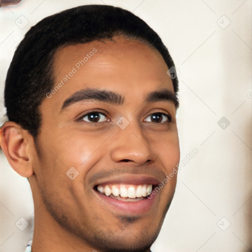 Joyful latino young-adult male with short  brown hair and brown eyes