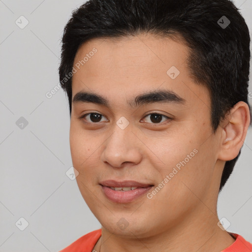 Joyful latino young-adult male with short  brown hair and brown eyes