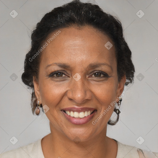 Joyful black adult female with short  brown hair and brown eyes