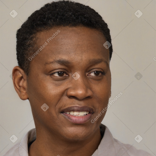 Joyful black young-adult male with short  brown hair and brown eyes