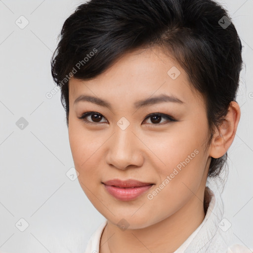 Joyful asian young-adult female with medium  brown hair and brown eyes
