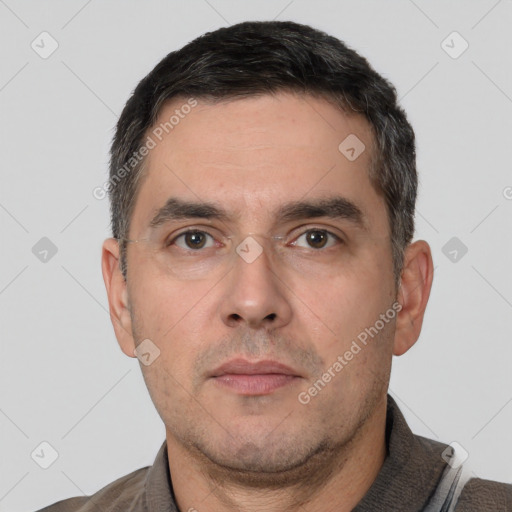 Neutral white adult male with short  black hair and brown eyes