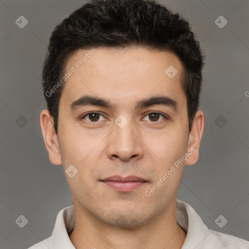 Joyful white young-adult male with short  black hair and brown eyes