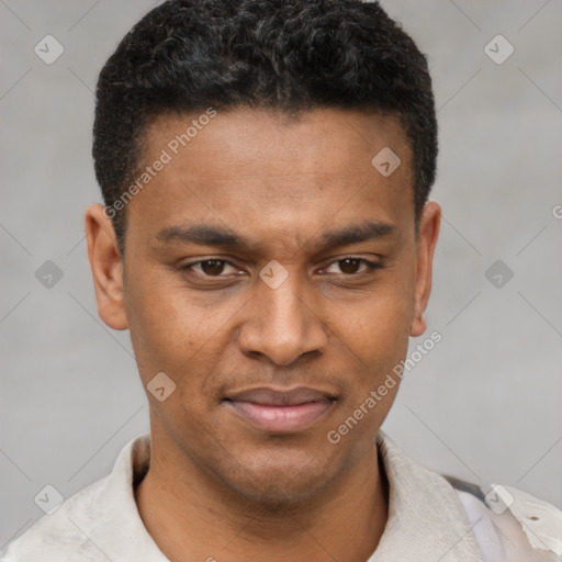 Joyful latino young-adult male with short  brown hair and brown eyes