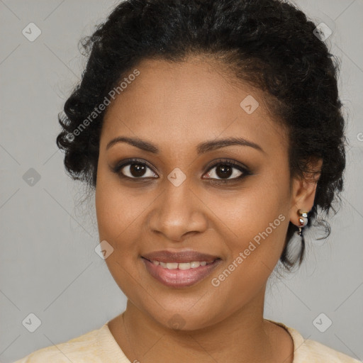 Joyful black young-adult female with medium  brown hair and brown eyes