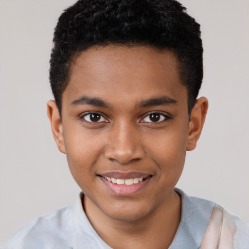 Joyful black young-adult male with short  brown hair and brown eyes