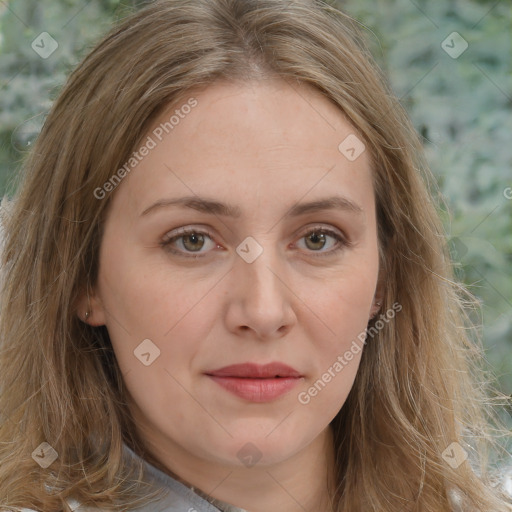 Joyful white young-adult female with long  brown hair and green eyes