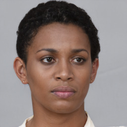 Neutral black young-adult female with short  brown hair and brown eyes