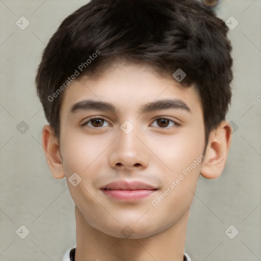 Joyful white child male with short  brown hair and brown eyes