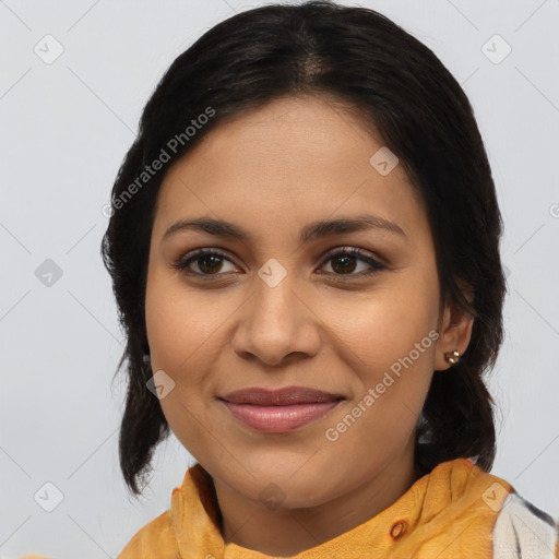 Joyful latino young-adult female with medium  brown hair and brown eyes