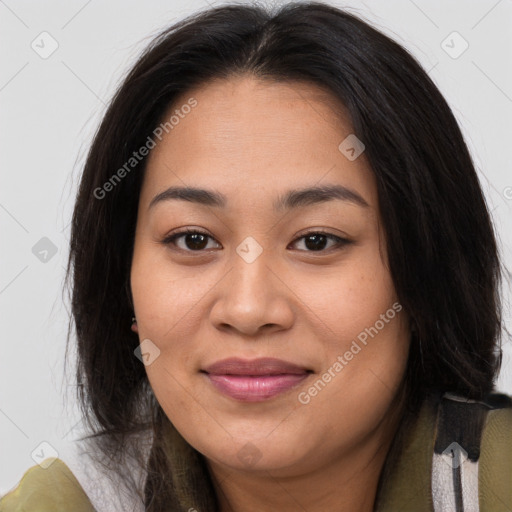 Joyful asian young-adult female with long  brown hair and brown eyes